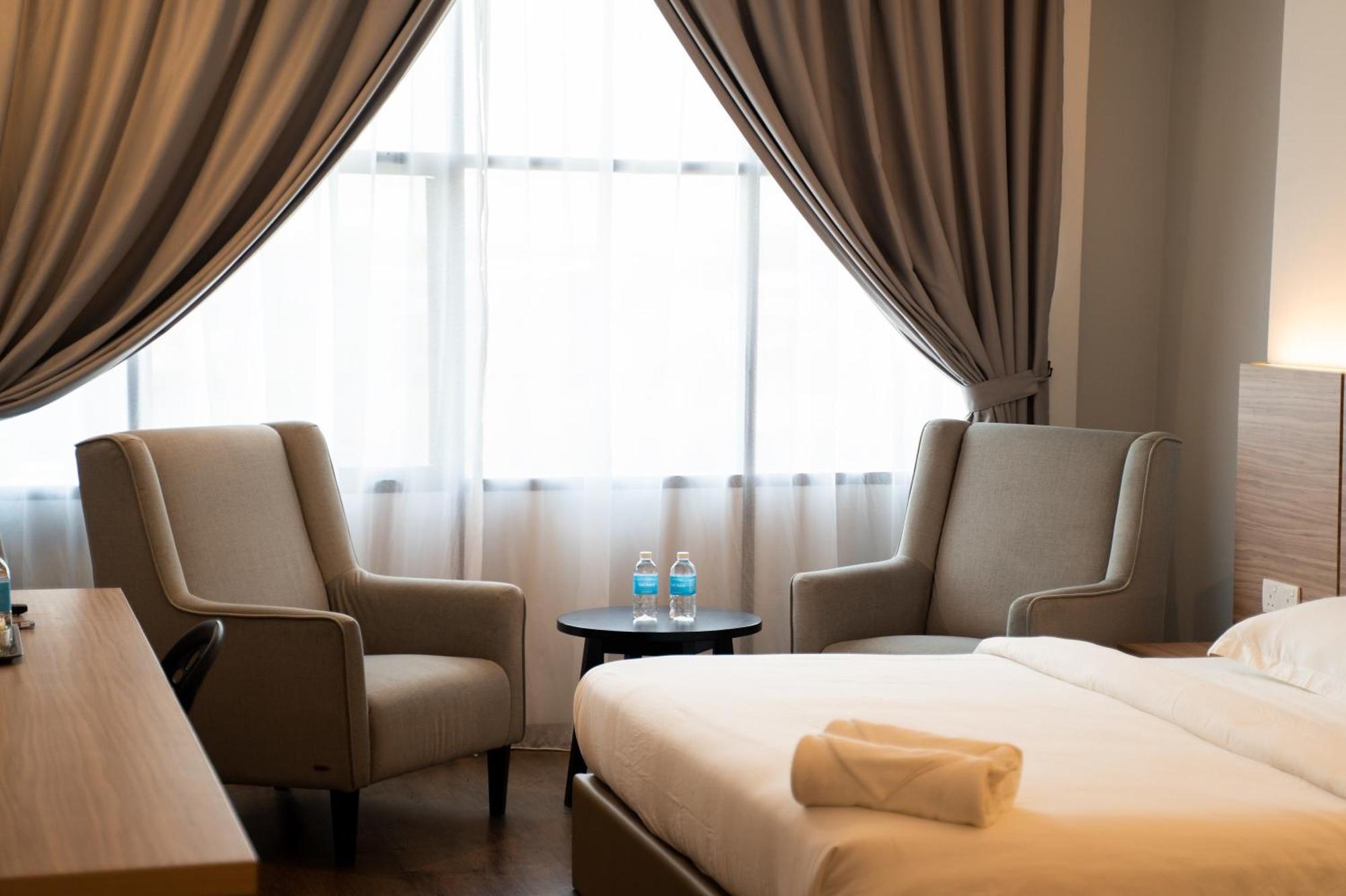 Rm Hotel Muar Extérieur photo